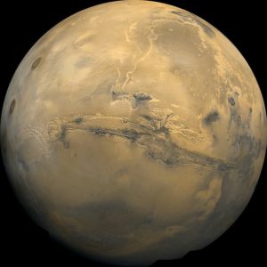 Mars with Valles Marineris clearly visible By NASA / USGS (see PIA04304 catalog page) - http://nssdc.gsfc.nasa.gov/photo_gallery/photogallery-mars.html http://nssdc.gsfc.nasa.gov/image/planetary/mars/marsglobe1.jpg, Public Domain, https://commons.wikimedia.org/w/index.php?curid=19400